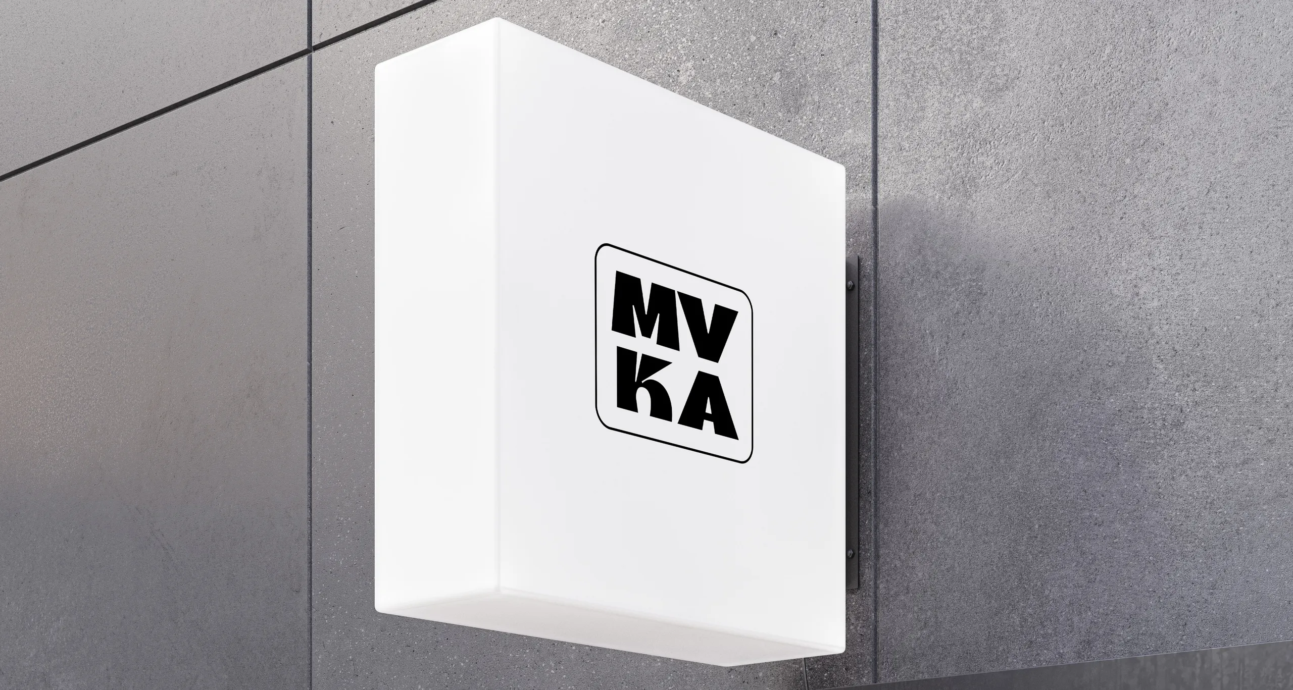 MV KA light sign mounted on a concrete wall