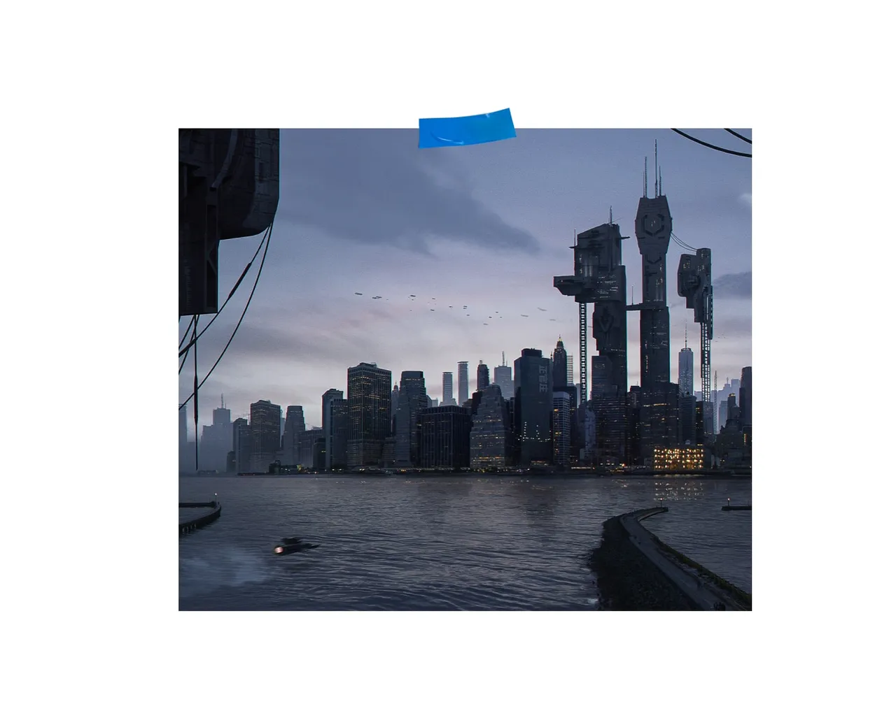 White panel with a photograph held by blue tape