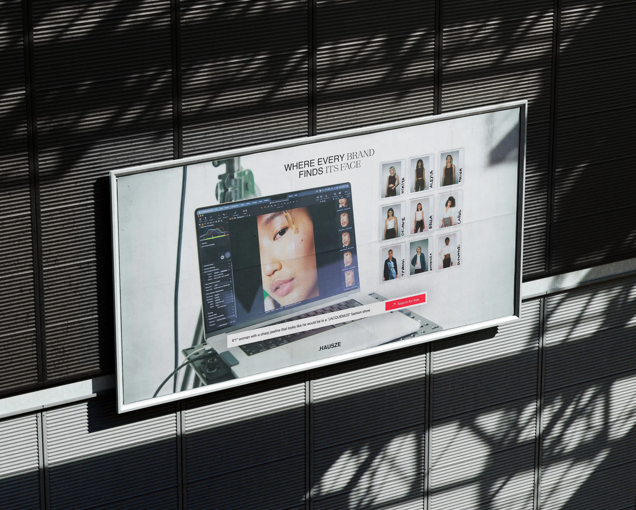 HAUSZE advertising screen in a city shop window